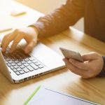 businessman working with modern laptop devices, student using digital tablet computer and mobile smart phone,business concept,selective focus,vintage color