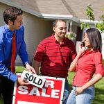 Extensive series of a Caucasian Real Estate Agent and African-American Couple in front of a home.